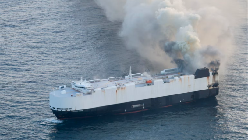 Focus shifts to salvage of evacuated, burning vehicle carrier off Alaska